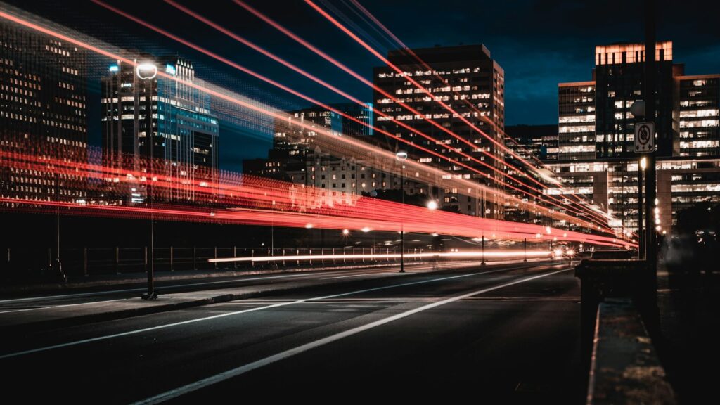 Picture of street lights flashing through, symbollizing performance and speed for Performance Plugins section